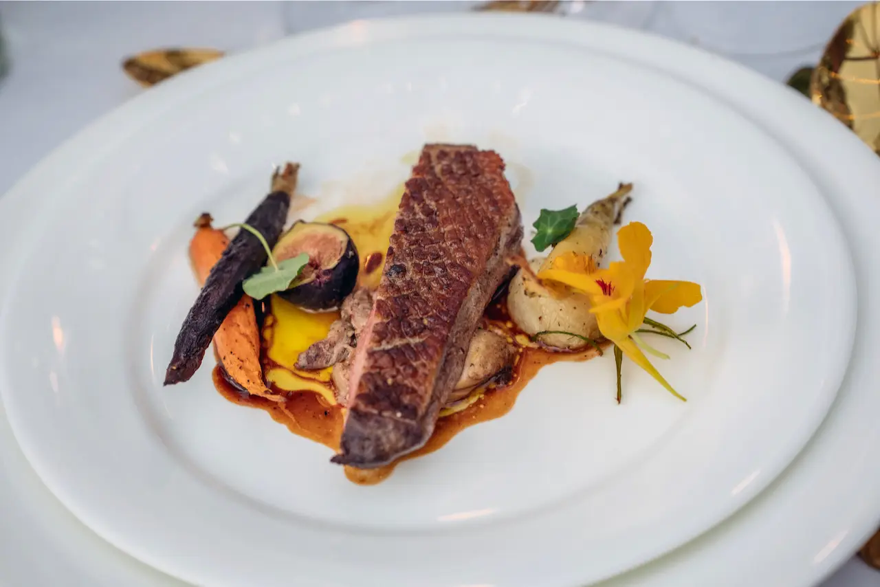 tented outdoor wedding venue in the hudson valley salmon and veggie course